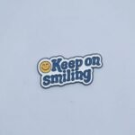KEEP ON SMILING